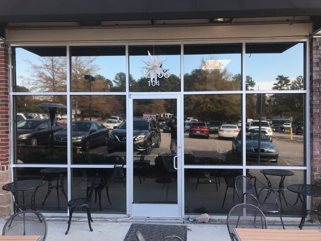Commercial reflective window tint outdoor shop