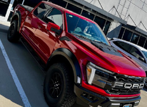 red truck turbo tint store front