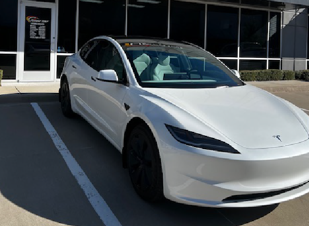 white tesla turbo tint store front window tint